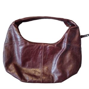 HOBO International brown soft leather bag with strap.